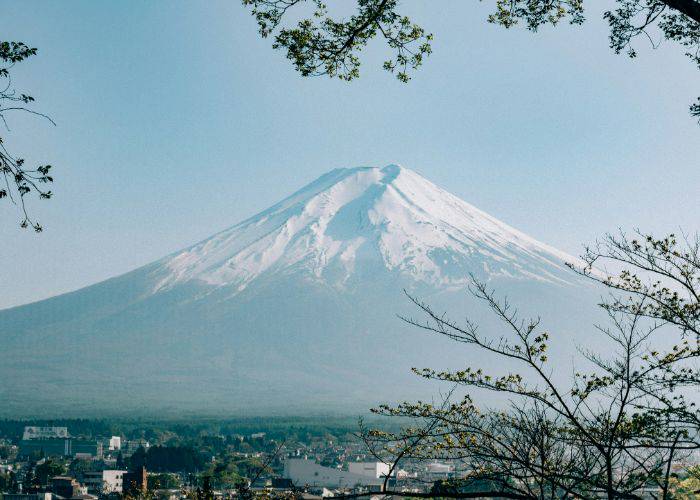 A shot of Mt. Fuji, towering above a town in Shizuoka.